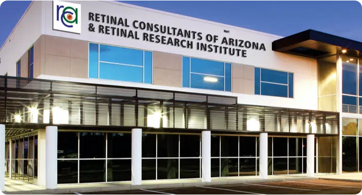 Photo of the the exterior of a building that says, "Retinal Consultants of Arizona & Retinal Research Institute"