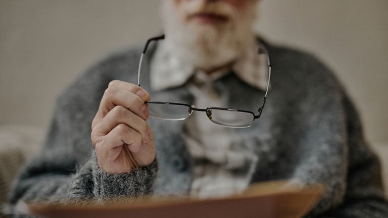 Image of an older man realizing he has vision changes.